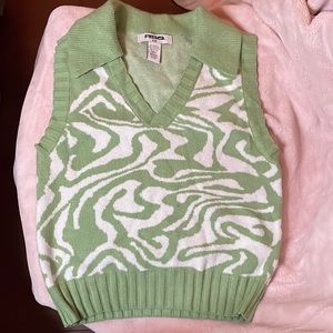 Nice sweater vest only worn twice really soft and warm